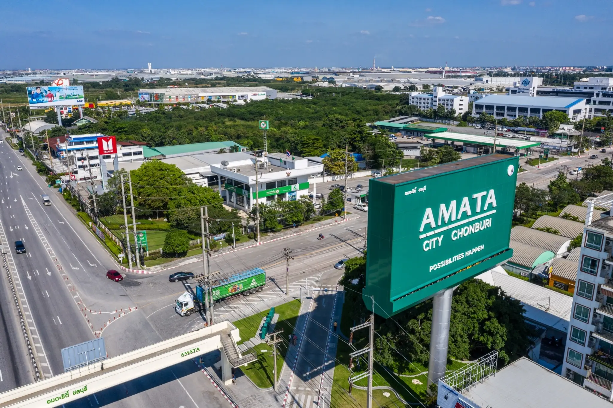 Aerial view of AMATA City Chonburi, the estate's sign beside the main road
