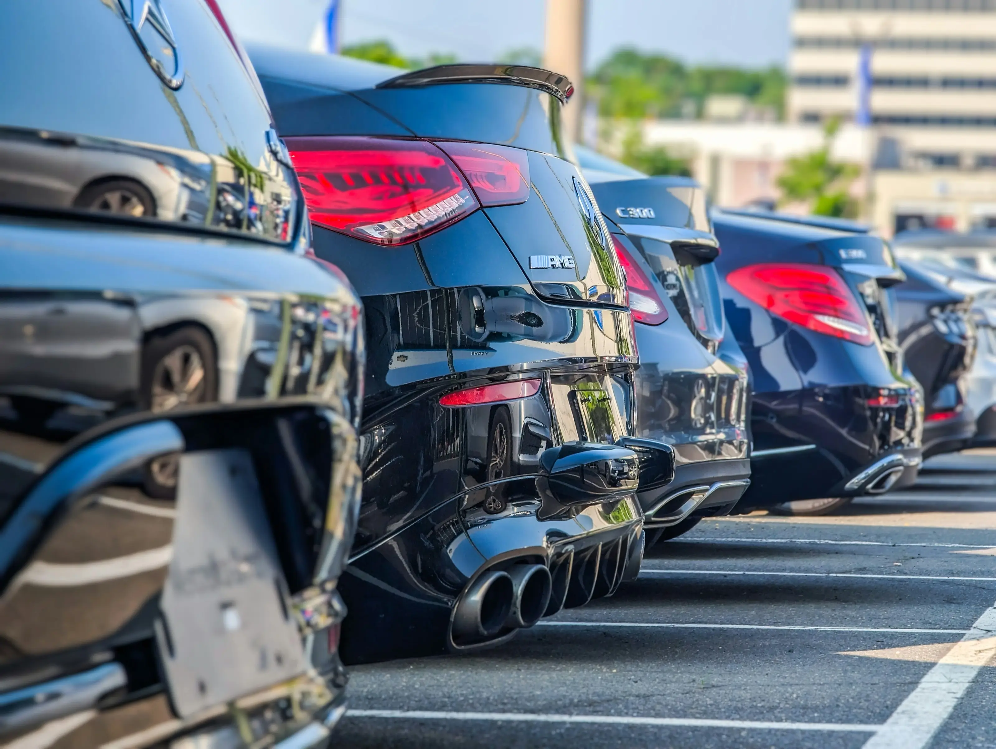 Rows of parked cars, seen from behind