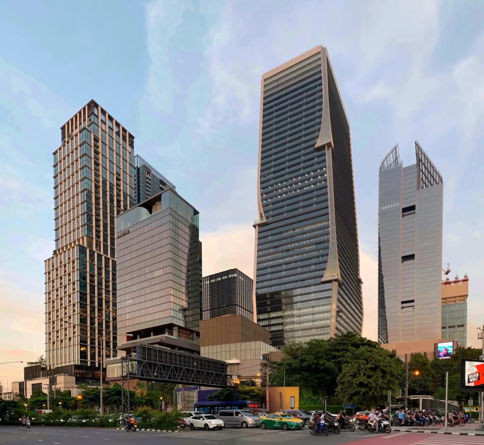 One Bangkok's towers and plaza at dusk